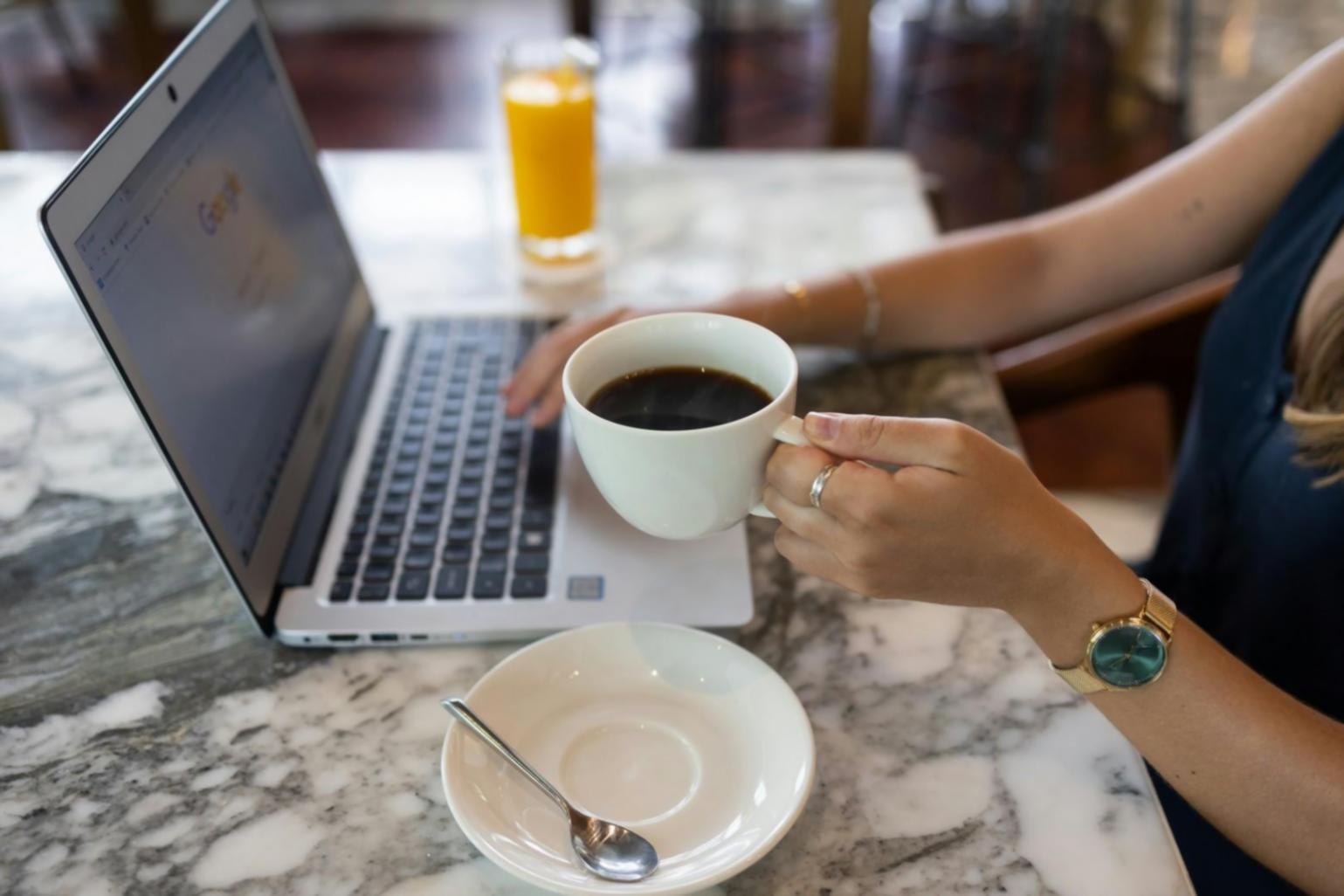 Digital expense tracking setup with mobile device and documents